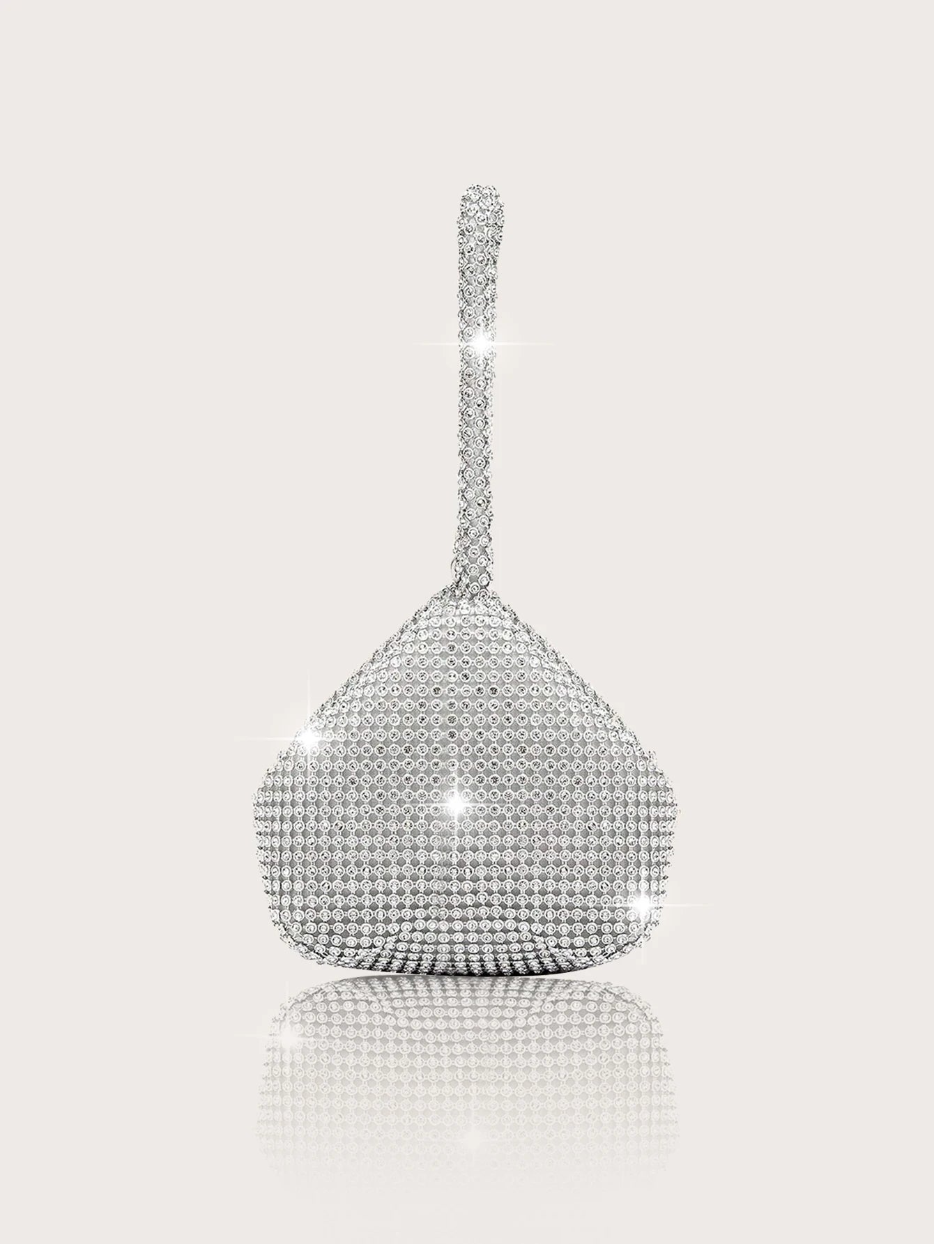 Elegant and luxurious rhinestone-encrusted evening bag and clutch, paired with a four-piece necklace, earrings and bracelet.-belleandkai.com