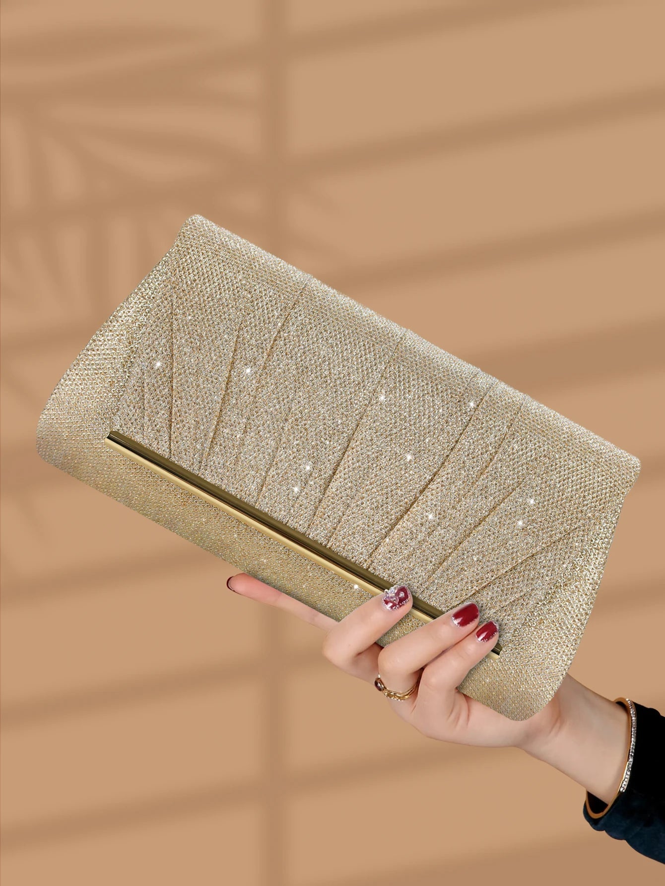This shiny and luxurious pleated evening bag is a great choice for party girls, office workers and also makes a great gift.-belleandkai.com